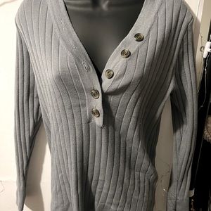 Button accent sweater